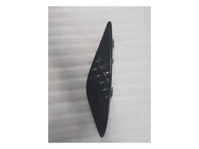 Rear bumper · 后保险杠左气帘装饰板